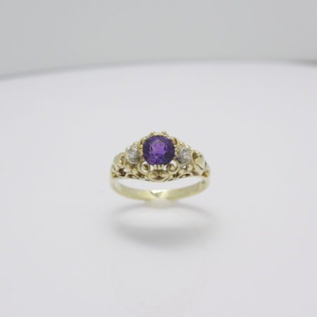 Gouden vintage ring met diamant en amethist