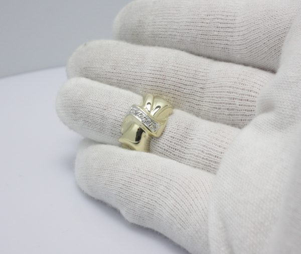 Gouden ring strikje met zirkonia