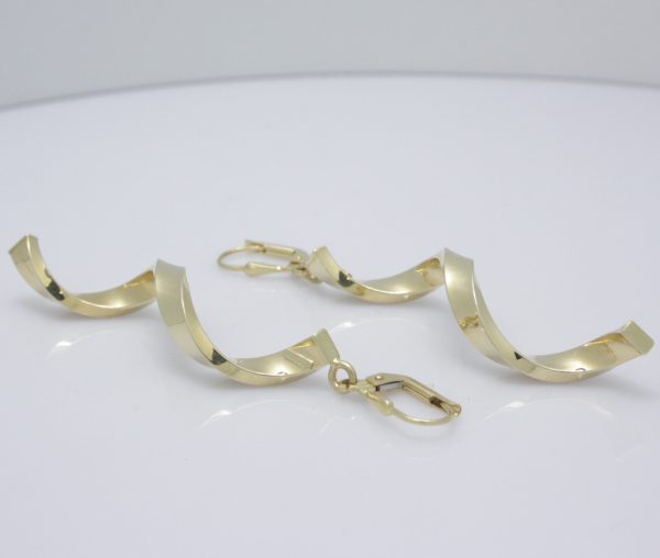 Gouden oorbellen wokkel